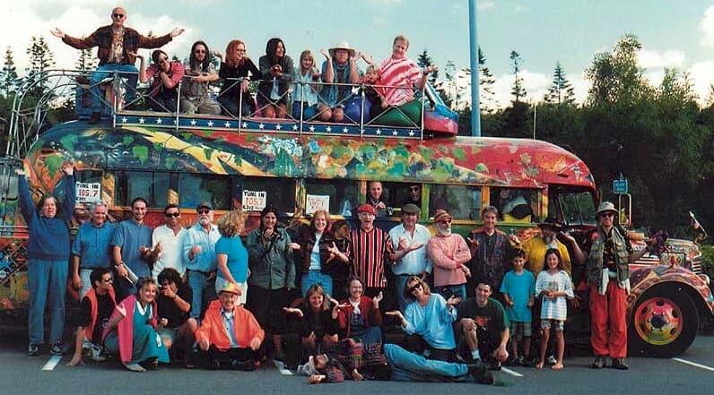 Ken Kesey, center, with The Merry Pranksters in 1969